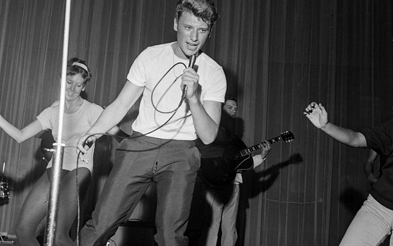 Johnny Hallyday (1943-2017), acteur et chanteur français. Paris, Olympia, septembre 1961.