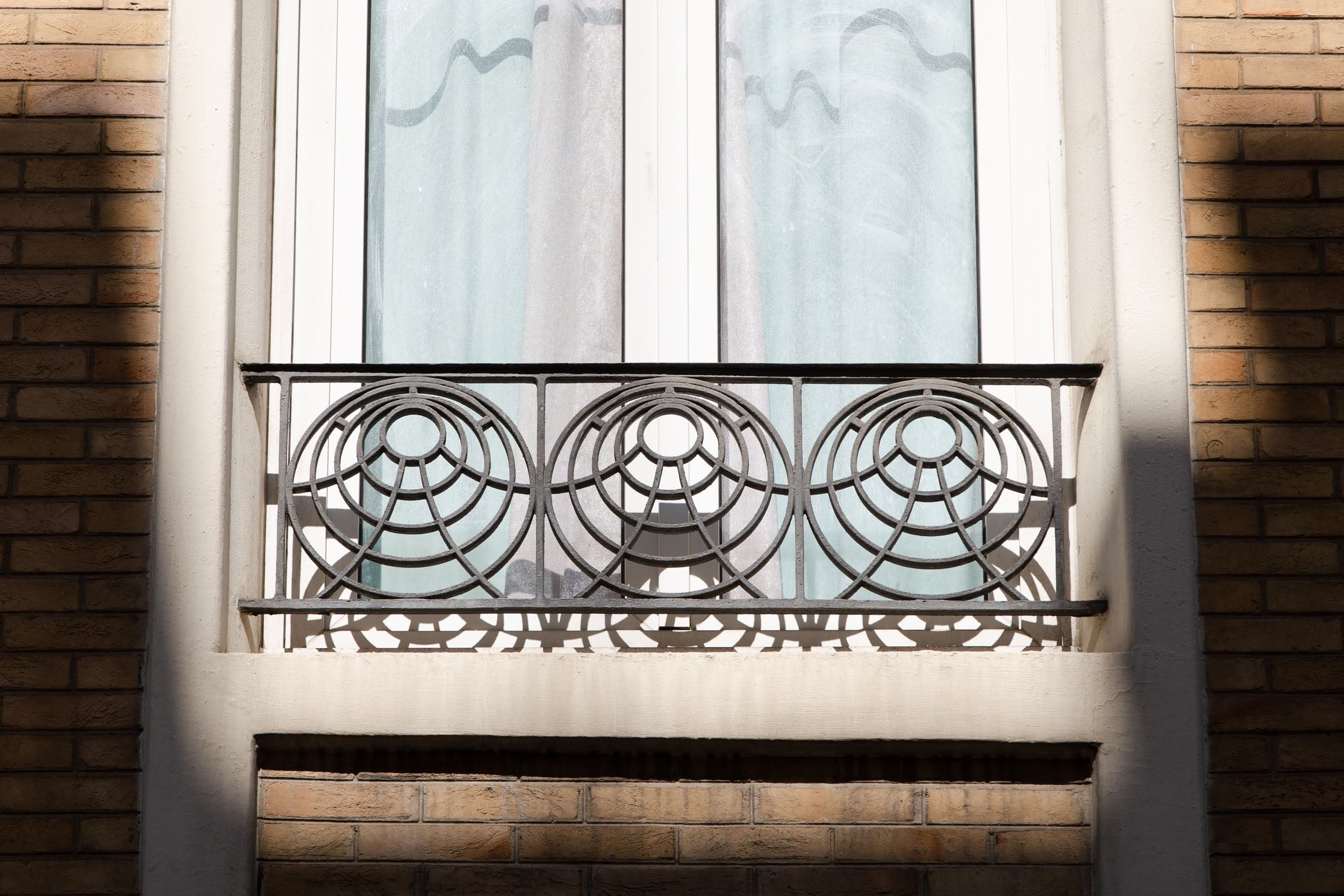 Immeuble HBM avec structure en béton armé apparente, au 7 rue de Trétaigne à Paris 18e, 1903-1904