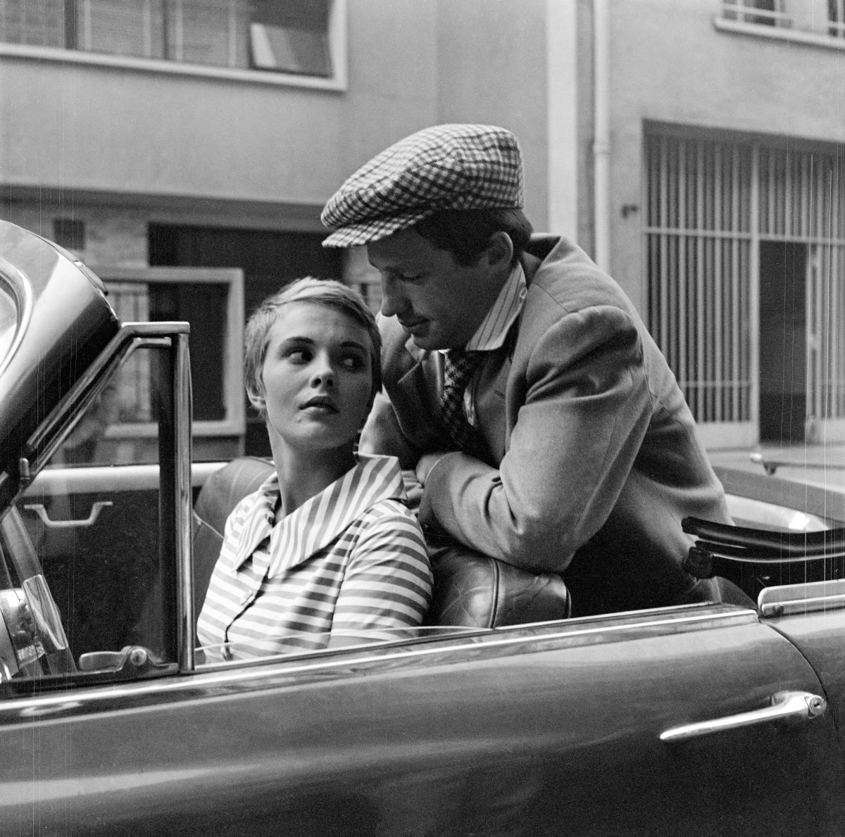 Jean Seberg (1938-1979), actrice américaine, et Jean-Paul Belmondo (1933-2021), acteur français, lors du tournage d'"A bout de souffle", film de Jean-Luc Godard. France, septembre 1959.