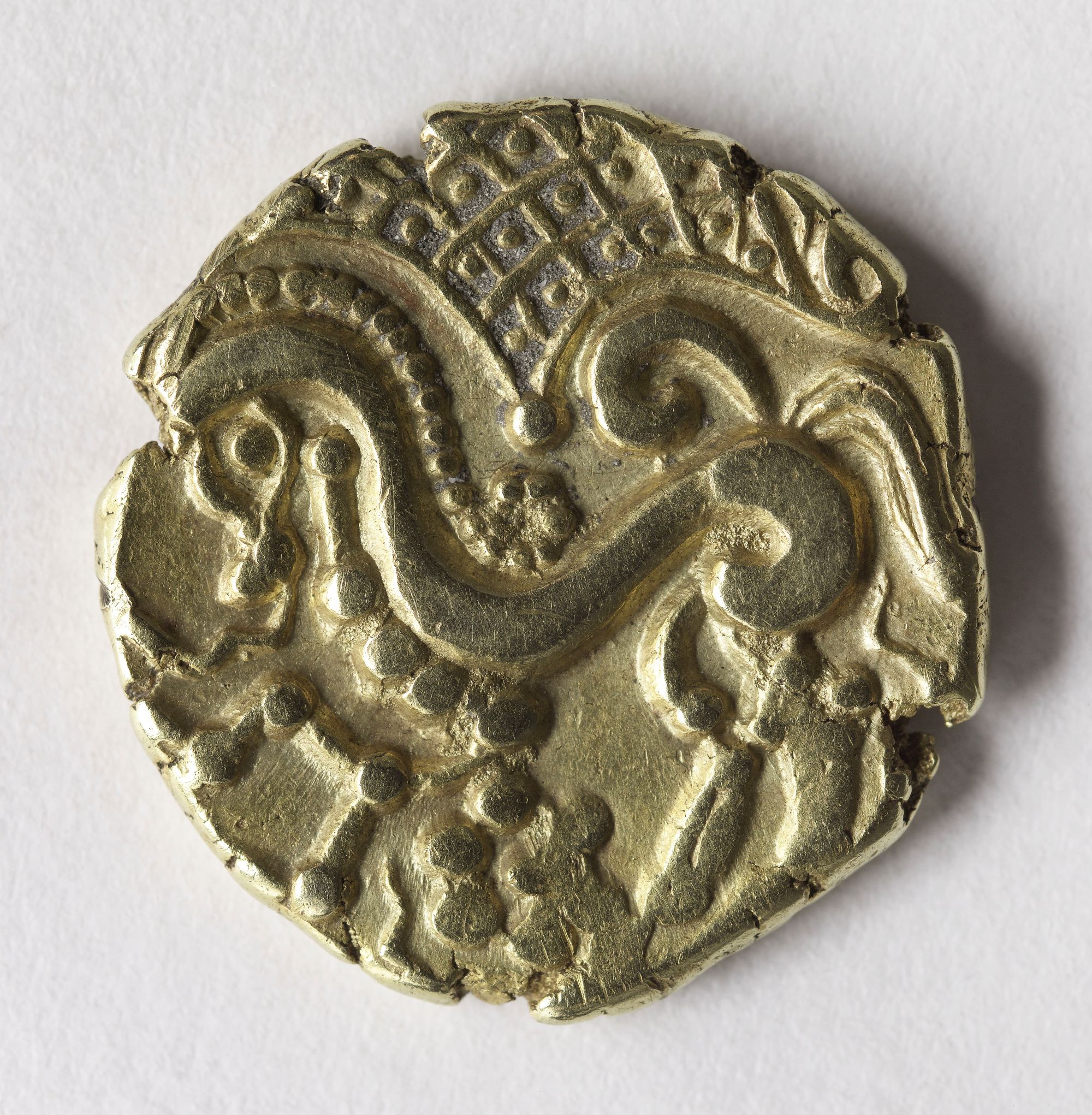 Monnaie en or représentant un cheval