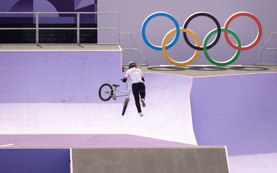 A figure known as the tail whip at the BMX finals at Parc urbain de la Concorde.