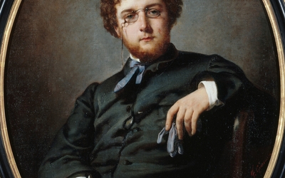 Portrait de Bizet avec des lunettes et qui pose son coude sur une chaise