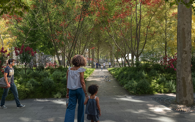 une vue de la future forêt urbaine de la place du Colonel Fabien, avec une perspective sur un chemin pavé la traversant