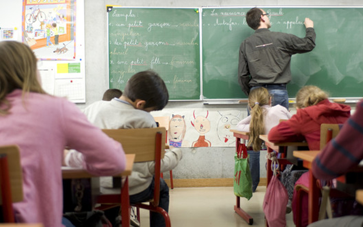 Photo d'une classe en pleine leçon