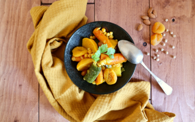 Assiette de tajine pois chiches, abricots et amandes.