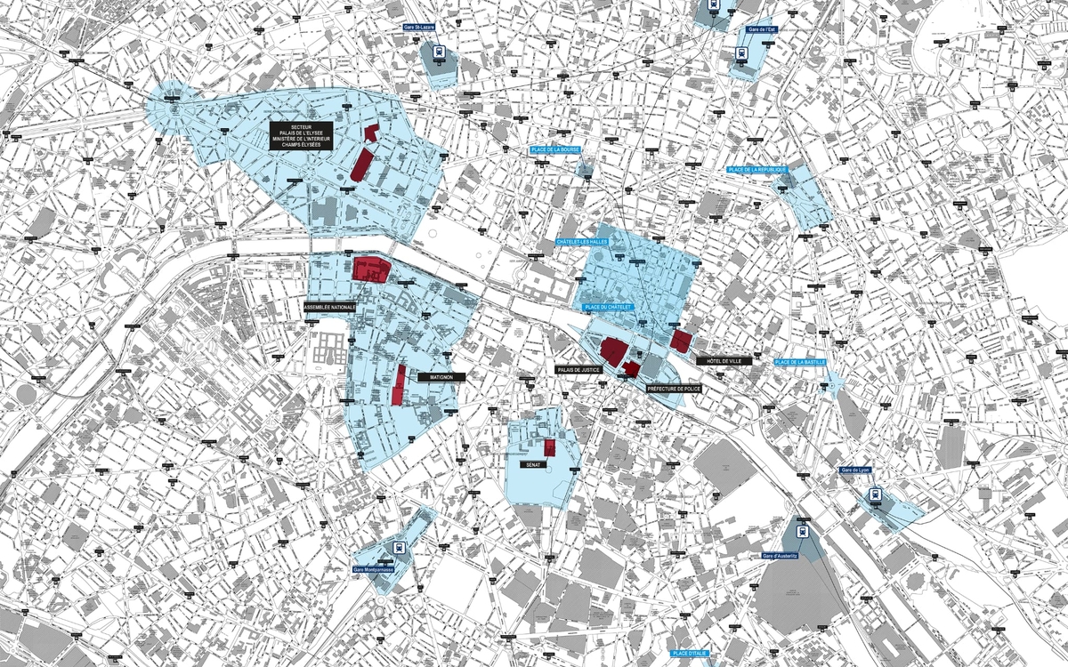 Photographie d'un plan de la ville de Paris avec les différentes zones concernées par les couvre-feux. 