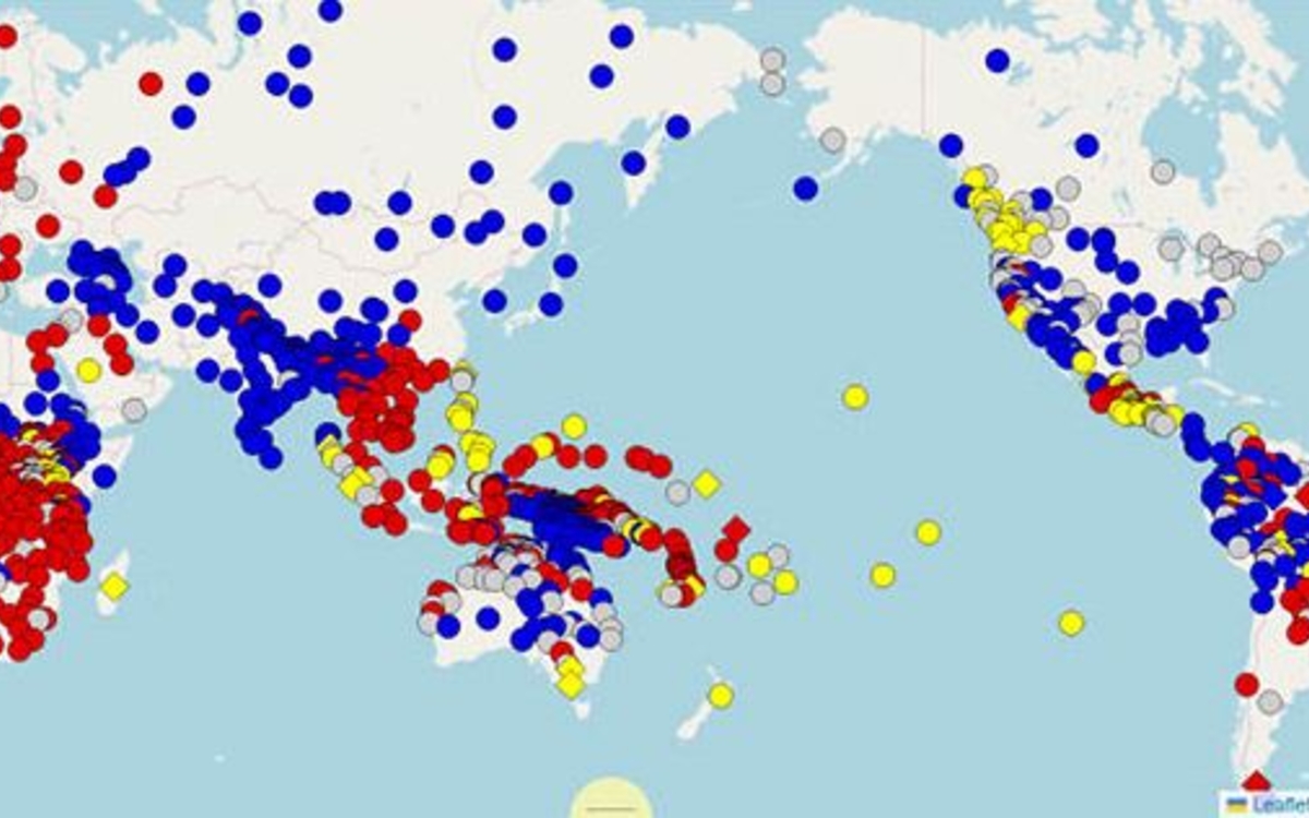 Un atlas du monde très coloré représente par des points les différentes langues parlées dans le monde