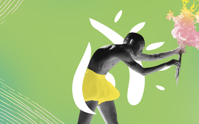 Un homme danseur brandissant un bouquet de fleurs.